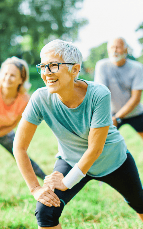 Older woman exercising outdoors